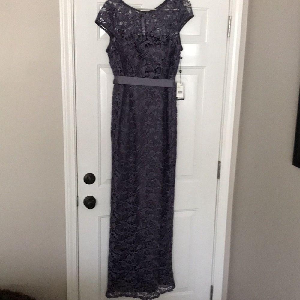 Adrianna Papell new with tags. Never worn.Grey/lavendar undertone.